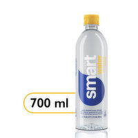 smartwater Passionfruit Mango, Vapor Distilled Premium Bottled Water, 23.7 Fluid ounce